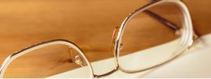 glasses sitting on life insurance papers